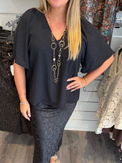 Wilma V-ringad topp Svart