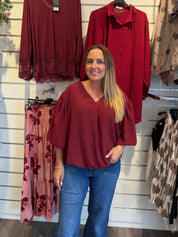 Saga V-ringad topp med ballong arm Bordo