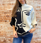 Åsa Ponchotröja Ansikte Svart