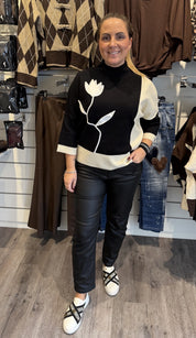Elena Ponchotröja Blomma Svart